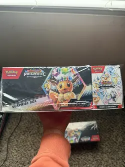 Pokemon Prismatic Evolutions Surprise Box Exclusive Promo Card & Booster Packs - Image 1