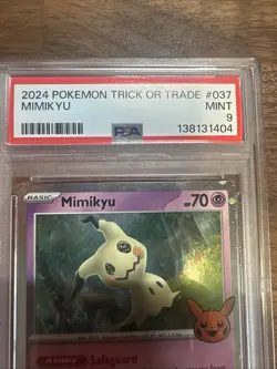 PSA 9 Mimikyu 2024 Trick or Trade Halloween Cosmos Pokemon Card - Image 2