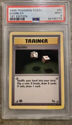 1999 POKEMON FOSSIL 1ST EDITION #60 GAMBLER PSA MINT 9 CRACKED HOLDER - Image 1