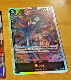 ONE PIECE ENGLISH CARTE GAME HOLO CARTE Brooke EB01-046 EN MINT - Image 1