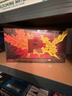 Pokemon TCG Team Rocket's Moltres ex Ultra-Premium Collection UPC in hand - Image 1