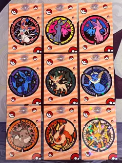 Pokemon Let's Go Eevee Card Database - Eeveelutions Pog Set - Image 1