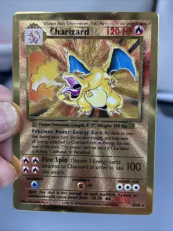 Gold Metal Charizard 4/102 - 25th Anniversary Celebrations - Pokemon Card - Image 1