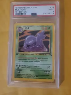 1999 POKEMON FOSSIL 1ST ED #13 MUK-HOLO PSA 9 - Image 1