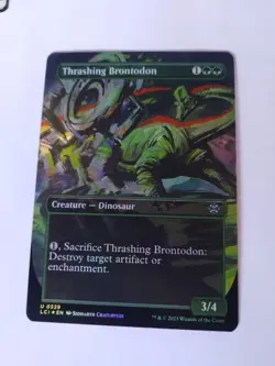 Thrashing Brontodon (Borderless) The Lost Caverns of Ixalan Foil - Image 1
