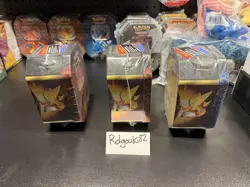 Pokemon Hidden Fates GX Tins Art Set of 3 Full Sealed Charizard Raichu Gyarados - Image 4
