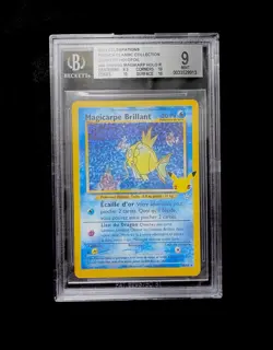 Carte Pokemon Magicarpe Brillant 66/64 Celebrations 25 ans FR Beckett 9 - Image 1