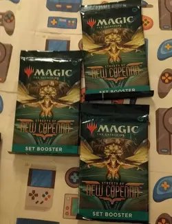 Lot of 3 Magic: The Gathering Streets of New Capenna Set Booster Packs - Image 2