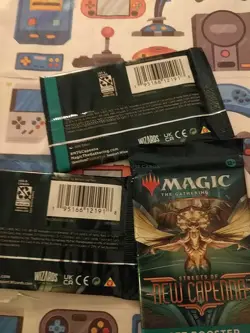 Lot of 3 Magic: The Gathering Streets of New Capenna Set Booster Packs - Image 3