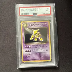 1997 POKEMON JPN ROCKET #65 DARK ALAKAZAM-HOLO PSA 9 - Image 1