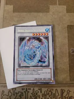 YUGIOH BRIONAC DRAGON OF THE ICE BARRIER HA01-EN022 SECRET LIMITED ED NM/VLP - Image 2