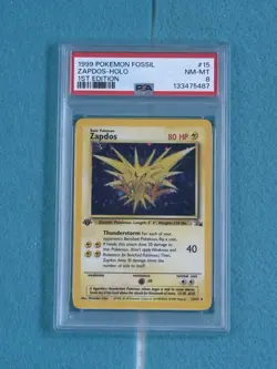 1999 Pokemon Fossil Zapdos Holo 1st Edition #15 PSA 8 - Image 1