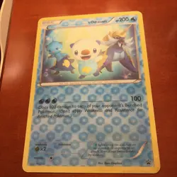 Pokemon TCG Jumbo Oversized ‘S Oshawott Black Star Promo Lenticular Pokemon Card - Image 1