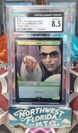 Graded MTG - CGC 8.5 - Secret Lair: Dr. Ian Malcolm (2023) - Egg Token (Foil) - Image 1