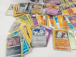 Large Bundle of Assorted Pokemon Cards with Tins and Ball Case Some Holo - Image 2