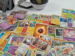 Large Bundle of Assorted Pokemon Cards with Tins and Ball Case Some Holo - Image 3