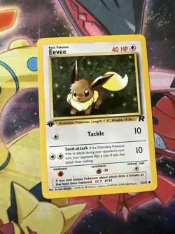 POKEMON EEVEE 55/82 1ST EDITION TEAM ROCKET LP - Image 1