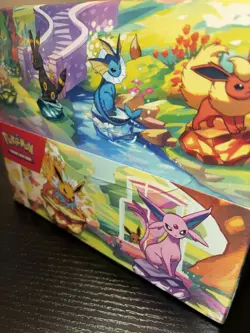 POKEMON SCARLET & VIOLET: PRISMATIC EVOLUTIONS MINI TIN BOX SEALED - Image 3