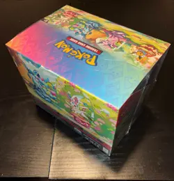POKEMON SCARLET & VIOLET: PRISMATIC EVOLUTIONS MINI TIN BOX SEALED - Image 4