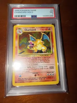 1999 POKEMON BASE SET UNLIMITED #4 CHARIZARD-HOLO PSA 7 - Image 1