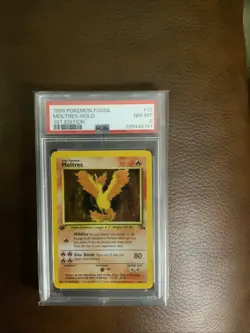 1999 Pokemon Fossil Moltres Holo 1st Edition #12 PSA- 8 - Image 1