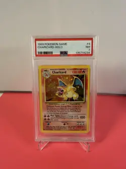 1999 Pokemon Base Set Unlimited #4 Charizard-Holo PSA 7 - Image 1