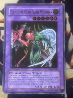 Yugioh: Elemental Hero Flame Wingman - TLM-EN035 - Ultimate Rare 1st Edition LP - Image 1