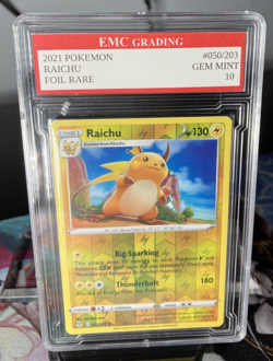 RAICHU #050/203 RARE FOIL Pokemon 2021 Card GRADED 10 MINT TCG CCG - Image 1