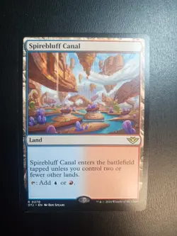 Spirebluff Canal Outlaws of Thunder Junction Regular Mint Rare Land - Image 1