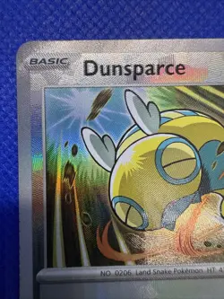 2025 Pokemon PRISMATIC EVOLUTIONS DUNSPARCE POKEBALL HOLO 79/131 PACK FRESH - Image 2