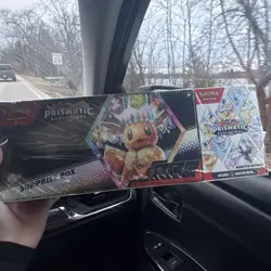 Pokemon Prismatic Evolutions Surprise Box Booster Bundle with Eevee - Image 1