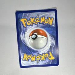 Pokemon Team Rocket's Mimikyu 097/217 Basic Stamped Holo Card 60 HP 2026 - Image 2