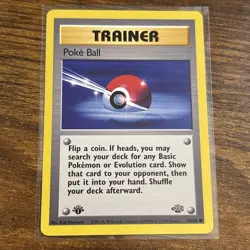 Poke Ball 64/64 Jungle Regular 1st Edition TRAINER Pokemon TCG LP/NMUUU - Image 1