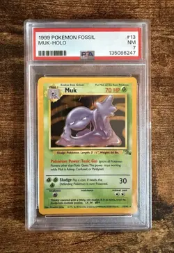 1999 Pokemon Fossil Muk Holo #13/62 PSA 7 - Image 1