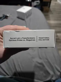 MTG Secret Lair x Transformers: Optimus Prime vs. Megatron Foil Edition, Sealed - Image 1