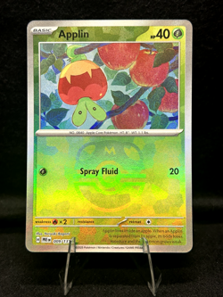 Pokemon TCG: Applin (Master Ball Pattern) 009/131 Sv: Prismatic Evolutions Holo - Image 1