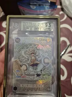 Luffy OP05-119 SEC A Fist of Divine Speed 3rd Anniversary Gold Card Bgs 9.5 - Image 1