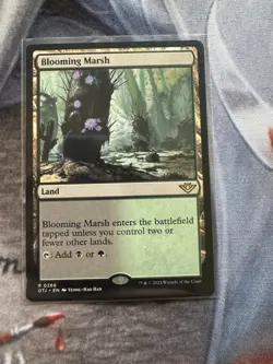 Blooming Marsh 266 | Near Mint | OTJ Outlaws of Thunder Junction Magic MTG - Image 1