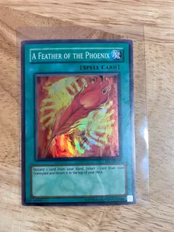 A Feather of the Phoenix FET-EN037 Flaming Eternity Unlimited - Yu-Gi-Oh! - Image 1