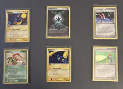 Reverse Holo Lanturn, Yanma, and Other Unseen Forces Pokemon Card Lot - Image 1