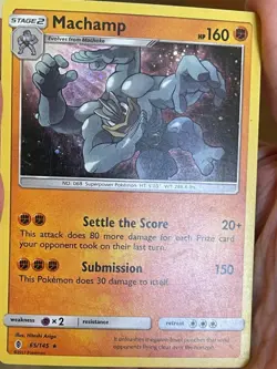 POKEMON MACHAMP 65/145 RARE COSMOS HOLOFOIL GUARDIANS RISING MP CARD - Image 1