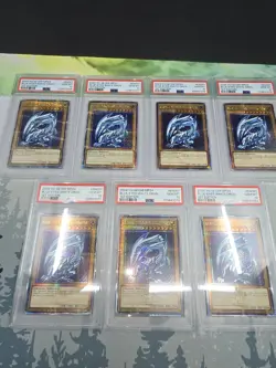 YUGIOH PSA 10 7X Blue-Eyes White Dragon MP24-EN001 QCR 1st Edition SDK ART - Image 1