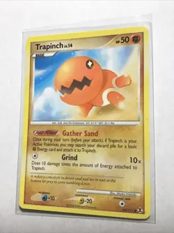 TRAPINCH - 84/111 - Rising Rivals - Pokemon Card - LP - Image 1