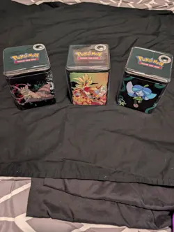 3 BRAND NEW-Pokemon TCG: Stacking Tins (3 Booster Packs Inside each, 9 total) - Image 1