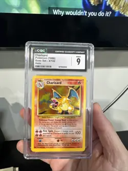 1999 POKEMON BASE SET, HOLO #4/102 CHARIZARD CGC 9 - Image 1