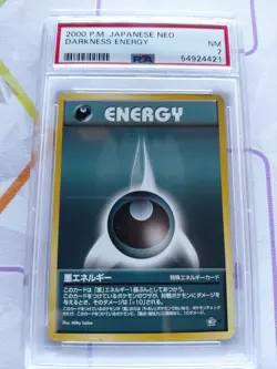 PSA 7 Pokemon 2000 Japanese Neo Darkness Energy - Image 1