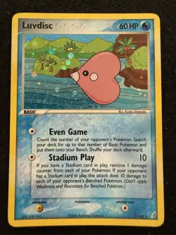 Pokemon Luvdisc Holo 7/100 from Crystal Guardians in DMG condition. - Image 1