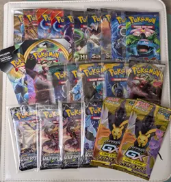 23 Sealed Pokemon TCG Packs – Japanese GX + English Sun & Moon, XY, Hidden Fates - Image 1