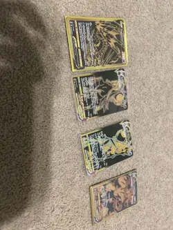 4 Pokemon golden and black cards all in great condition - Image 1