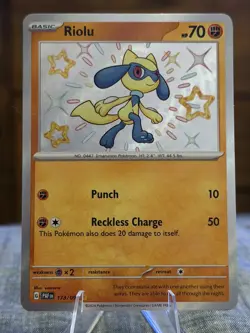 Riolu 173/091 SV: Paldean Fates Shiny Rare Holo NM Pokemon Card - Image 1
